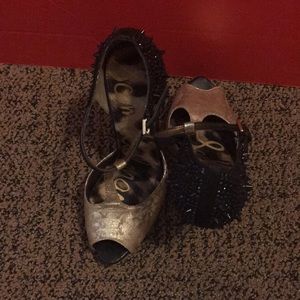 Gold with black spikes heels